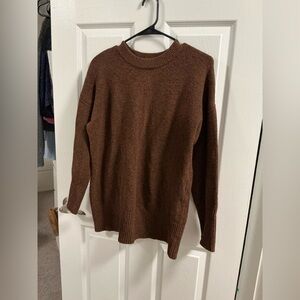 Brown sweater.